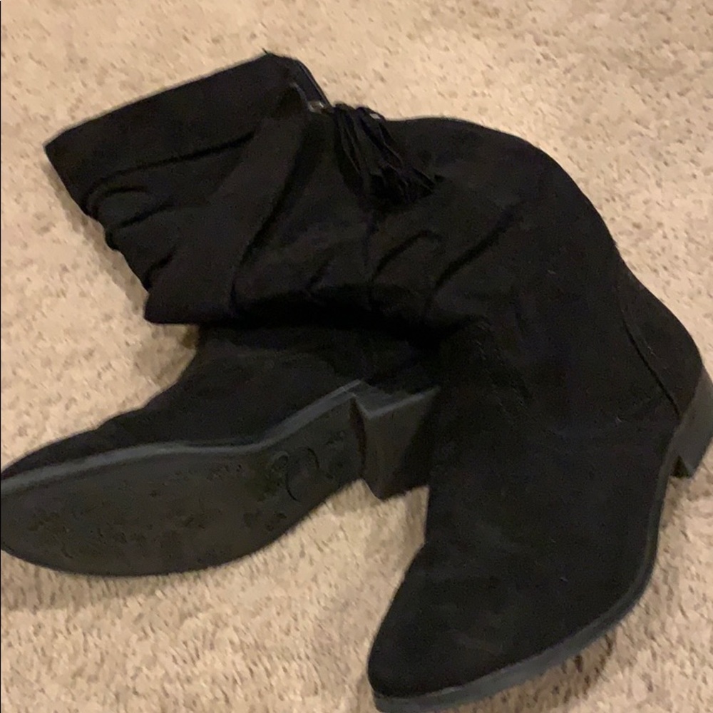 Steve Madden black boots.